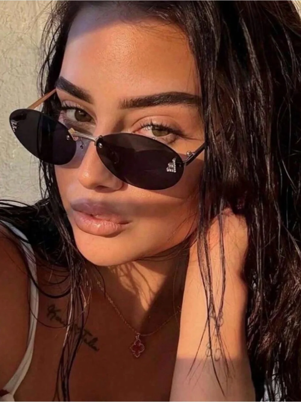 Rimless Oval Black Lens Sunglasses with Gold Temples